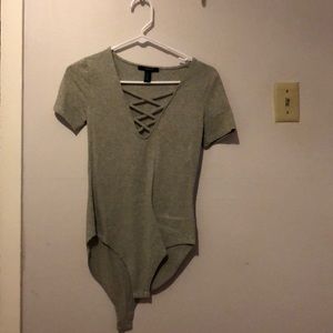 Grey body suit